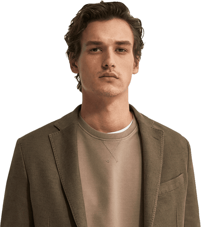 Fashion model wearing a beige long coat